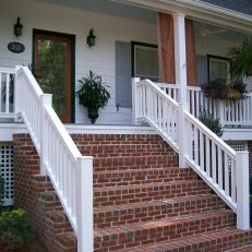White Porch With Red Brick Steps 