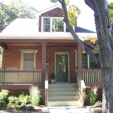Brick Home With Painted Brown Porch