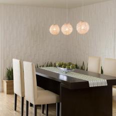 White Modern Dining Room With Round Pendants