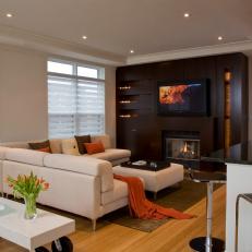 White and Orange Living Room With Wood Wall