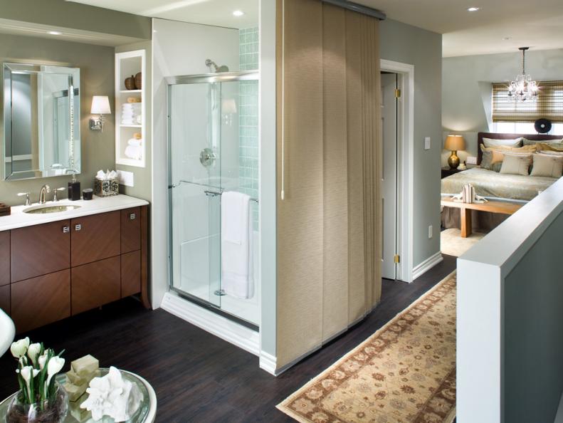 Neutral Bathroom With Single Brown Wood Vanity and Glass Shower Door
