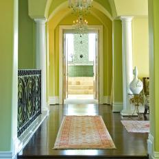 Chartreuse Hallway With Crystal Chandelier