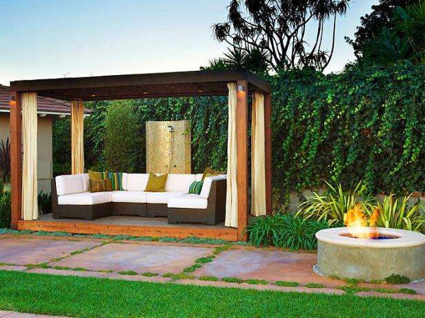 Modern Lighted Pergola With Firepit