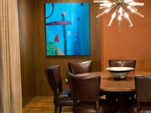 Artwork, Subdued Lighting Create Illusion of Depth in Dining Room