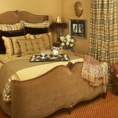Traditional Bedroom With Plaid Curtains and Linens