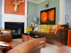 Blue Living Room With Orange Fireplace and Faux Taxidermy Deer Head