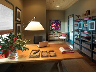 Neutral Home Office With Wood Desk, Storage Shelves and Colorful Art