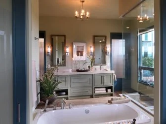 Master Bathroom with Drop-In Tub and Blue Accents