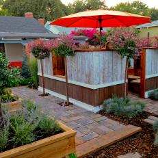 Backyard Dining Room with Raised Planters