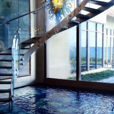 Indoor Pool Area With Spiral Staircase