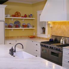 Tuscan Yellow Kitchen With White Cabinetry