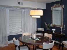 Transitional Dining Room With Navy Walls 
