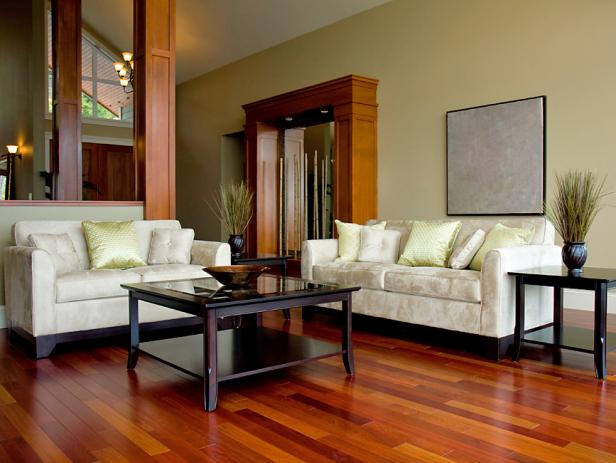 Brown laminate flooring in a living room. 