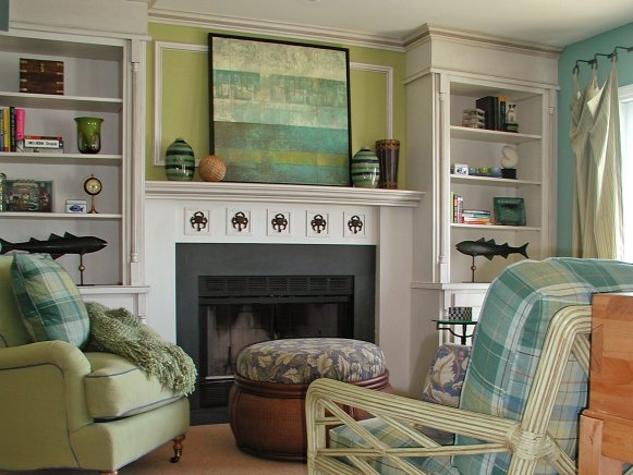 Sitting Room with White Built-In Bookshelves and Fish Decor