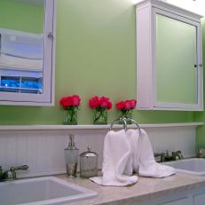 Soft Green Double Vanity Bathroom With White Fixtures