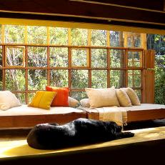 Daybeds In Front of Large Windows 