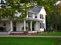 Exterior of White Farmhouse Home 