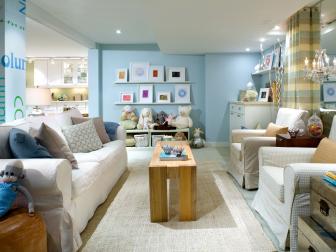 Blue Family Room With Neutral Sofa, Chairs and Wood Coffee Table