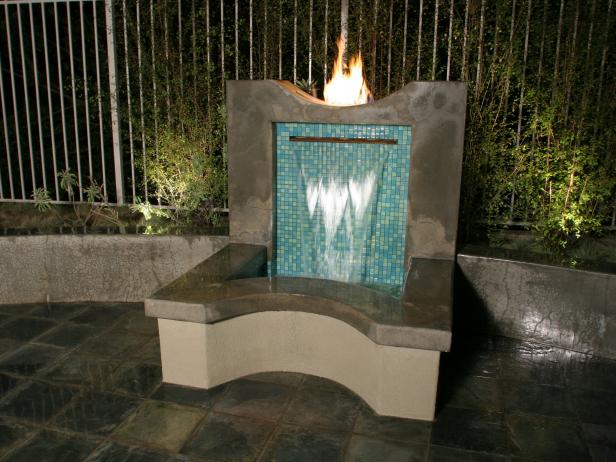 Outdoor Water Fountain With Tile Wall and Fire Element | HGTV