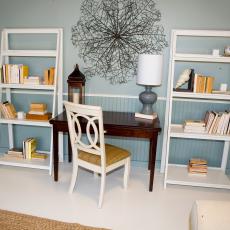 Pale Blue Office Area With White Bookcases