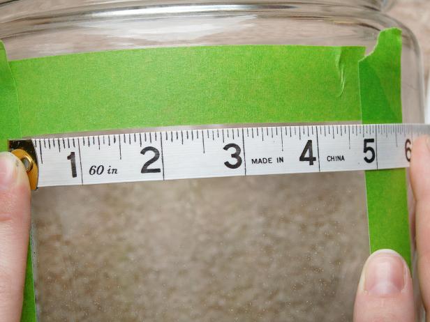 Measuring Glass Canister for the Correct Placement of Stencil