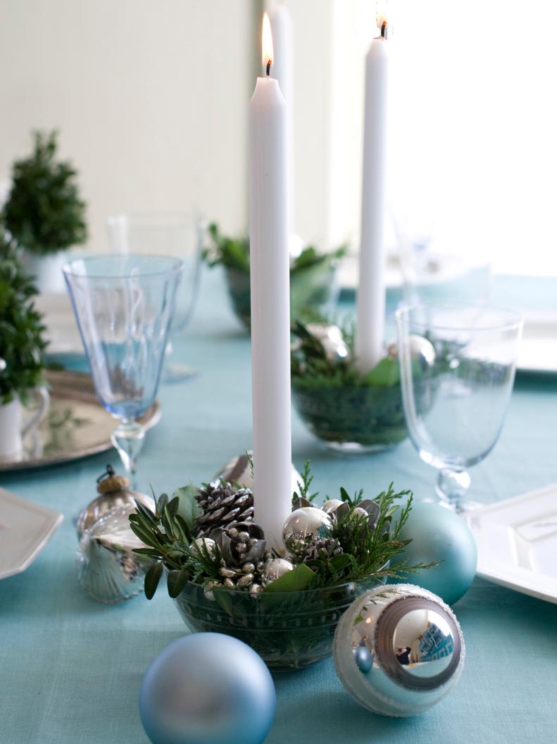 Candle Centerpieces With Evergreens and Ornaments 