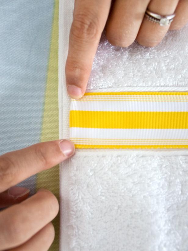 White and Yellow Striped Ribbon on Bath Towel