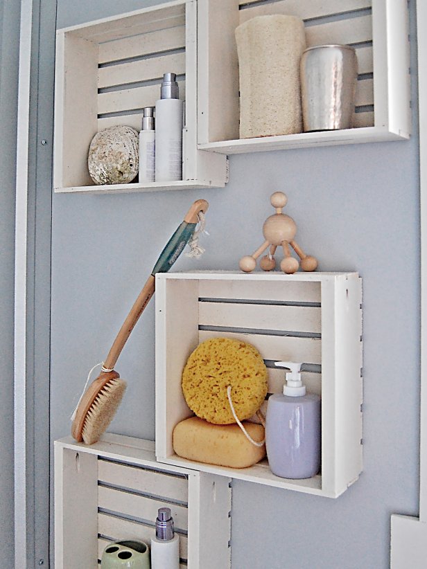 White Crates Used as Shelving in Light Blue Bathroom