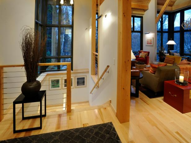 White Contemporary Hall With Blonde Wood Molding And Floor