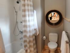 Traditional Guest Bathroom With Striped Shower Curtain 