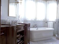 White Traditional Bathroom With Freestanding Tub and Wooden Vanity