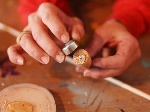 Apply Glue to Cork for a Decorative Wine Stopper