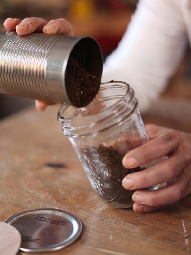 Filling Glass Jar With Soil Mix for Seed-Starting Kit