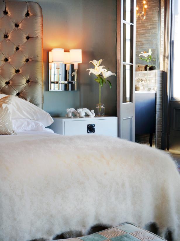 Gray Bedroom With Sconce