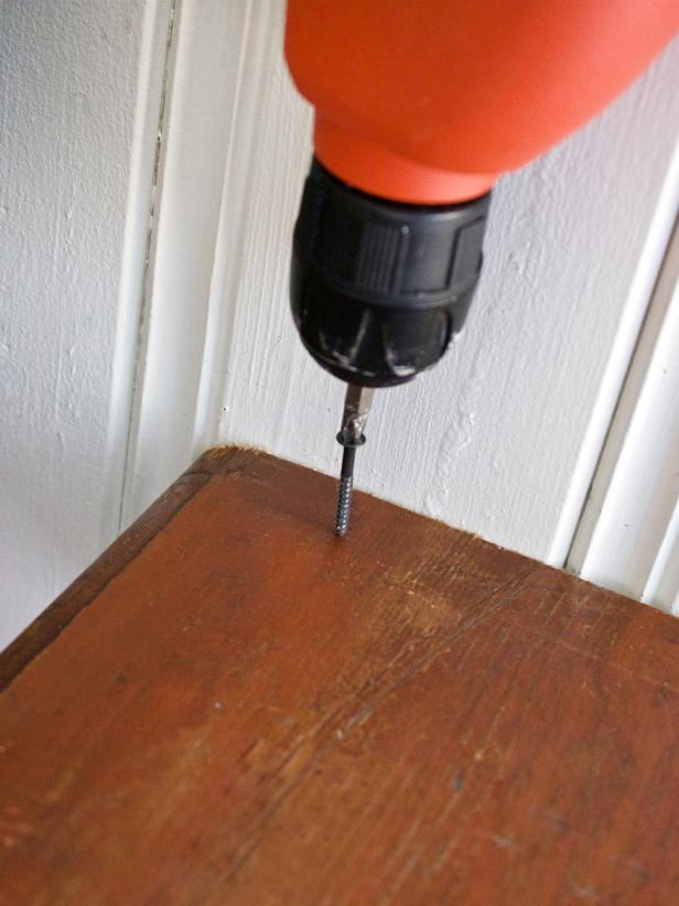 Attaching Bench to Wall With Power Drill and Screw