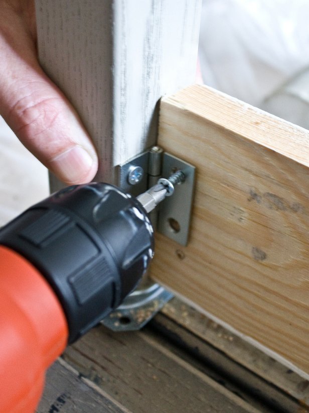 Drilling Screw Into Hinge Connecting Table Leg and Apron