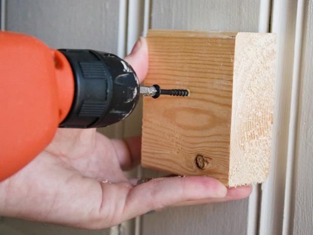 Attaching Wood Block to Wall With Electric Screwdriver