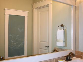 Bathroom with Large Mirror and Chalkboard
