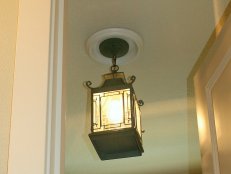 Converted Outdoor Light Fixture in Bathroom