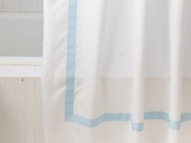 White Shower Curtain with Blue Border