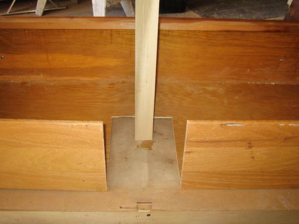 When revamping an existing bathroom vanity, see how much of the current fixture can be re-used for the new vanity. Drawers, for instance, can be dressed up, re-shaped and still used. Mark on the drawers where you will cut to leave space for the sink and pipes. Using a saw, cut out the shape.
