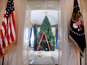 Workers Set Up Tree in White House Blue Room