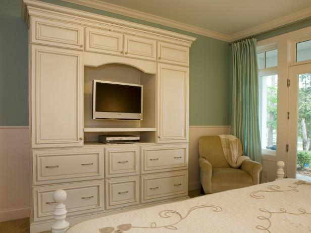 White Entertainment Center With Molding In A Traditional