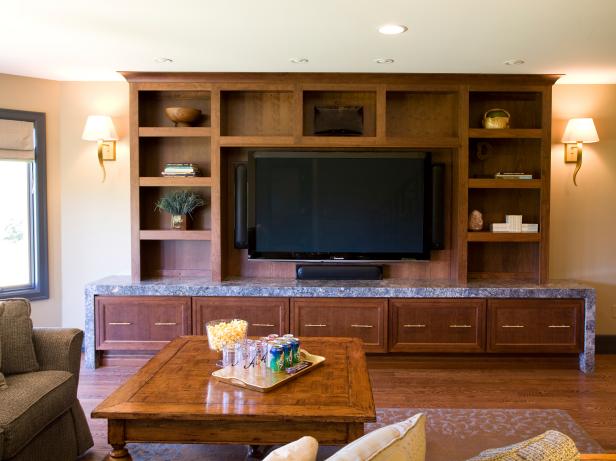 Large Wooden Entertainment Center With Stone Countertop | HGTV