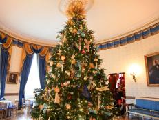 Large Decorated Christmas Tree in Center of White House Blue Room