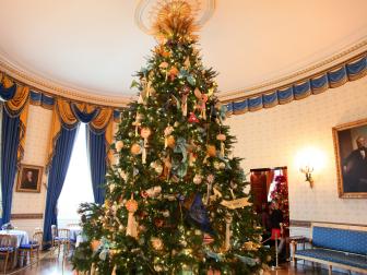 Large Decorated Christmas Tree in Center of White House Blue Room