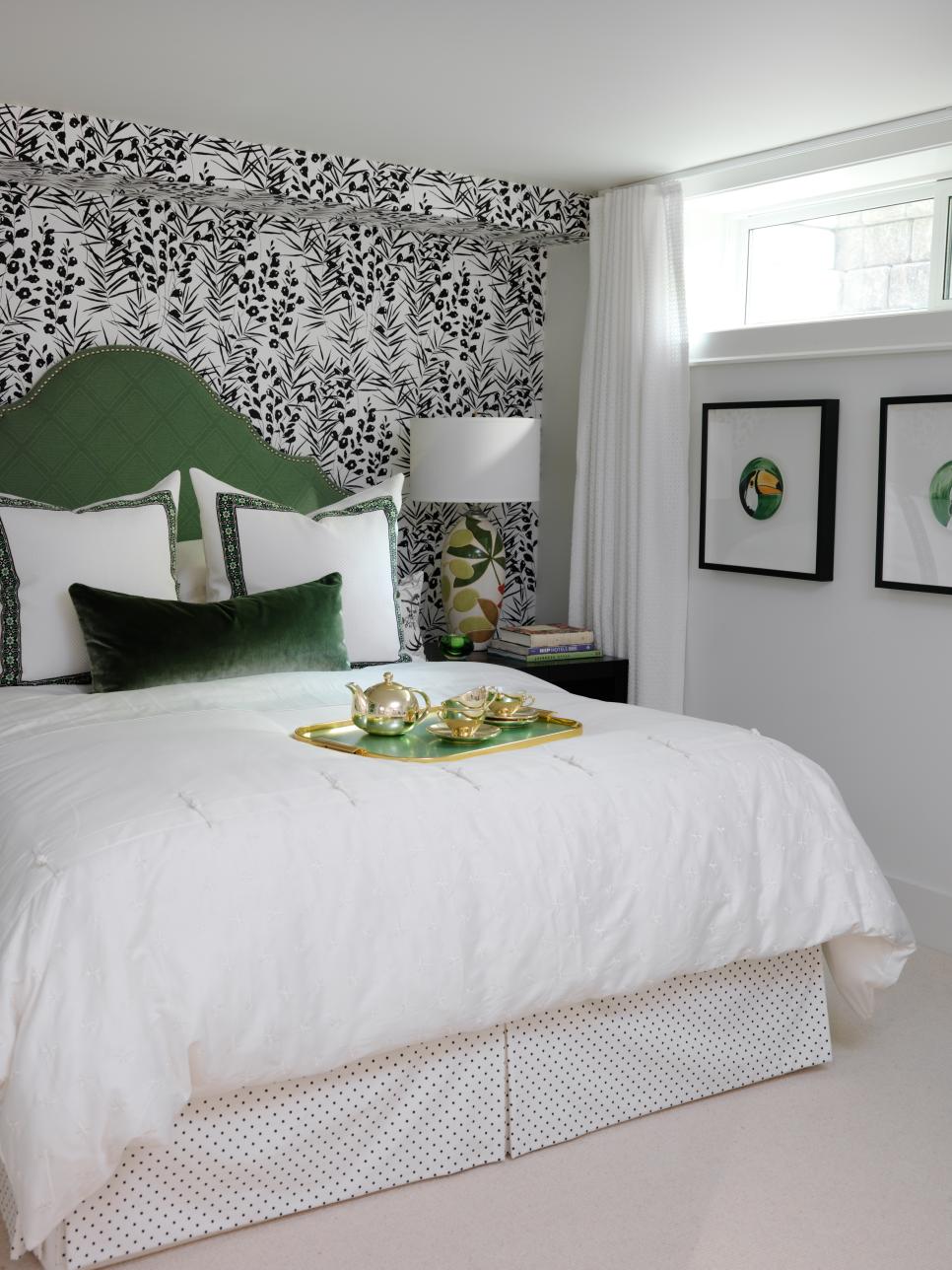 Asian Bedroom With Green Headboard and Patterned Wallpaper