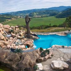 Multimillion Dollar Pool With Water Slides and Rope Swing