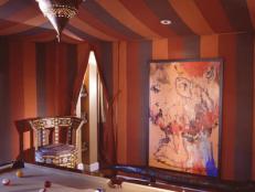 Moroccan-Style Game Room With Draped Striped Ceiling Fabric