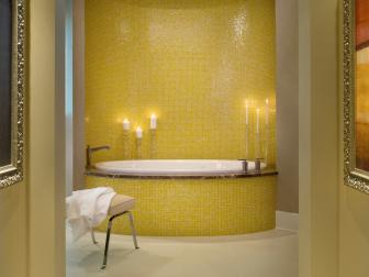Neutral Master Bathroom With Yellow Mosaic Tile Tub and Curved Wall